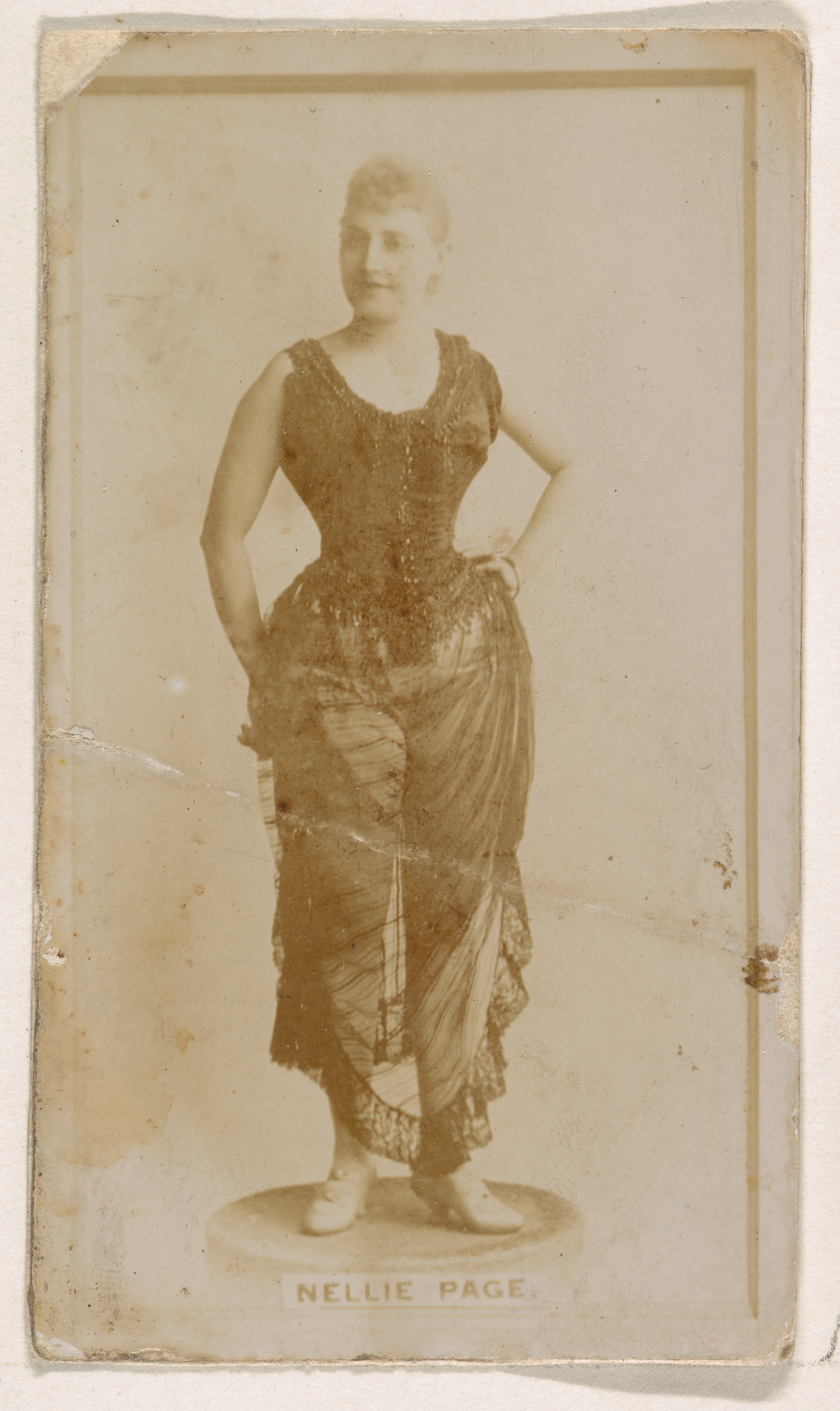 Nellie Page, from the Actresses series (N245) issued by Kinney Brothers to promote Sweet Caporal Cigarettes