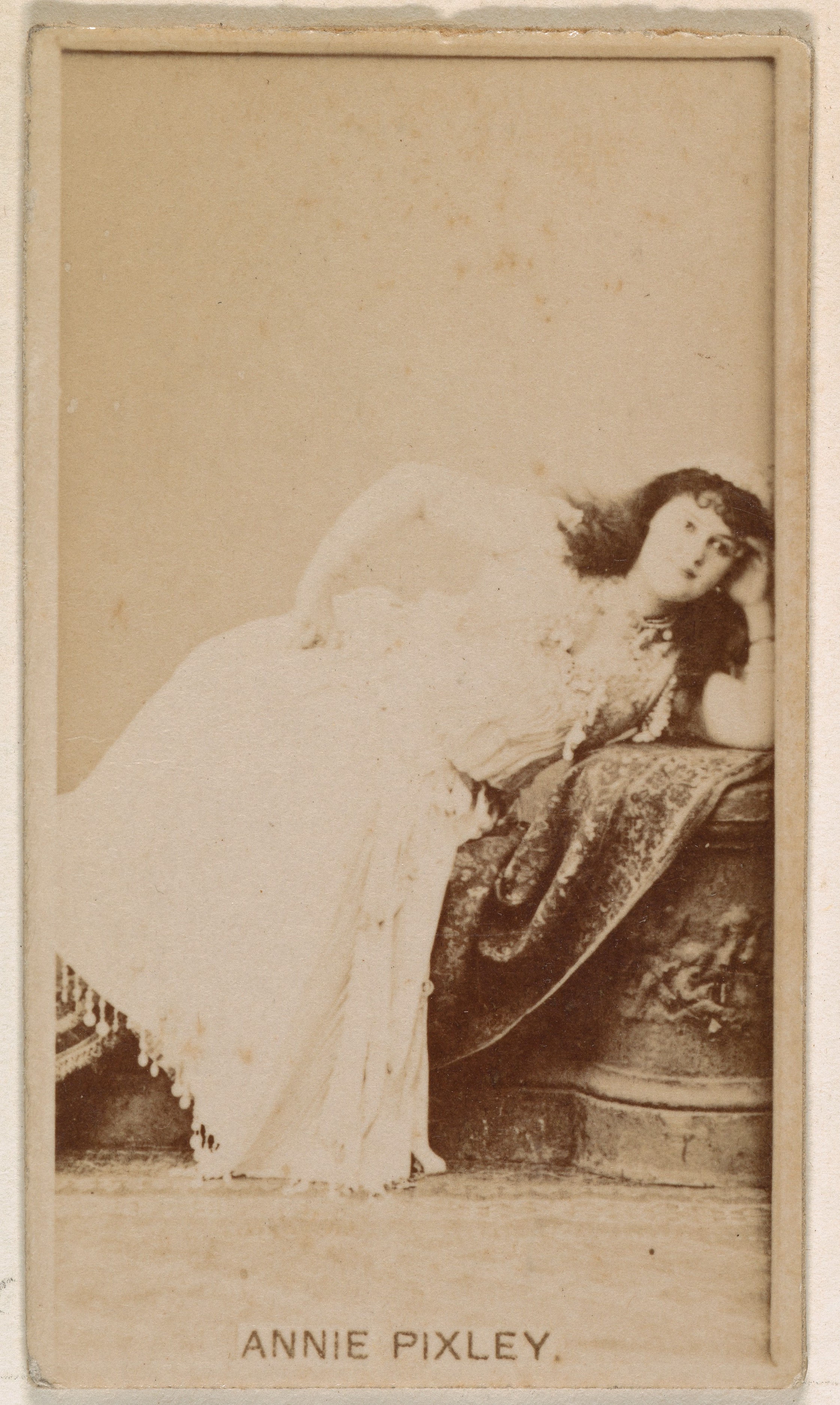 Annie Pixley, from the Actresses series (N245) issued by Kinney Brothers to promote Sweet Caporal Cigarettes