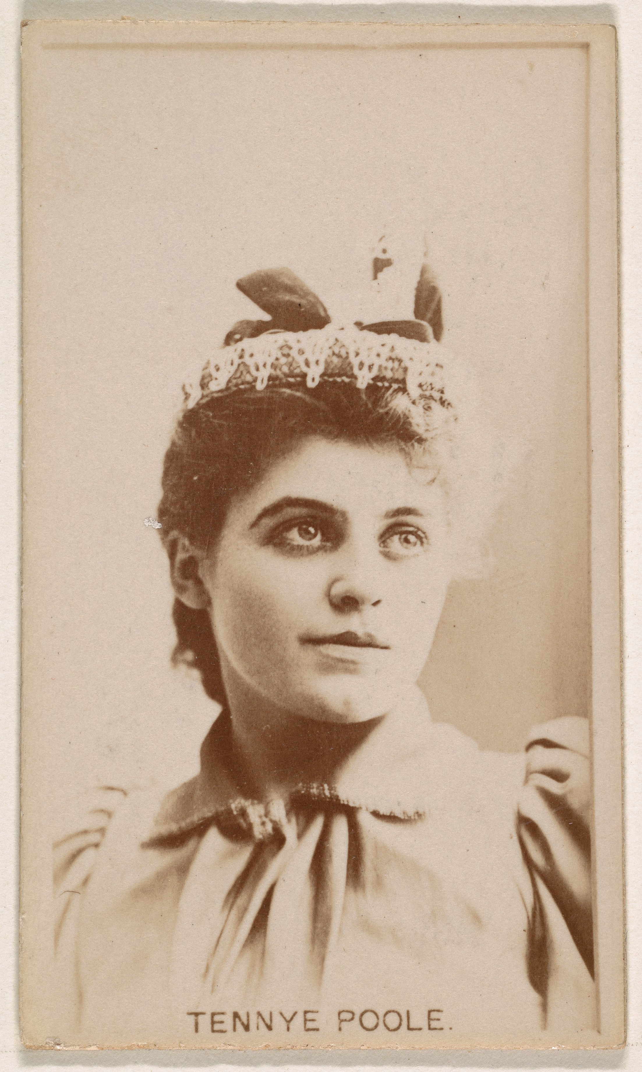 Tennye Poole, from the Actresses series (N245) issued by Kinney Brothers to promote Sweet Caporal Cigarettes