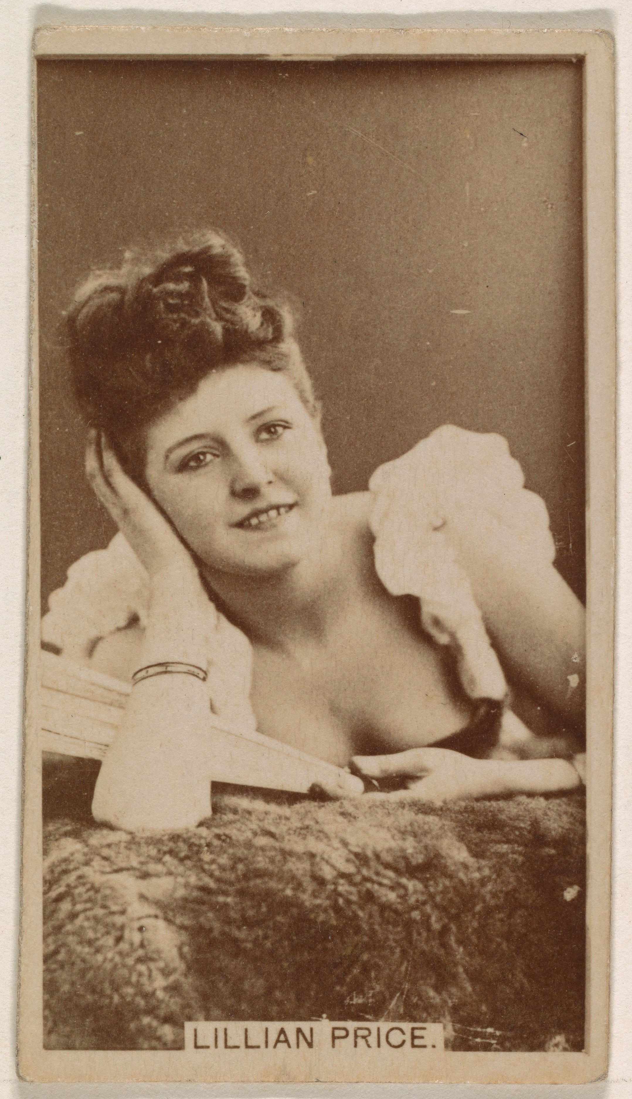 Lillian Price, from the Actresses series (N245) issued by Kinney Brothers to promote Sweet Caporal Cigarettes