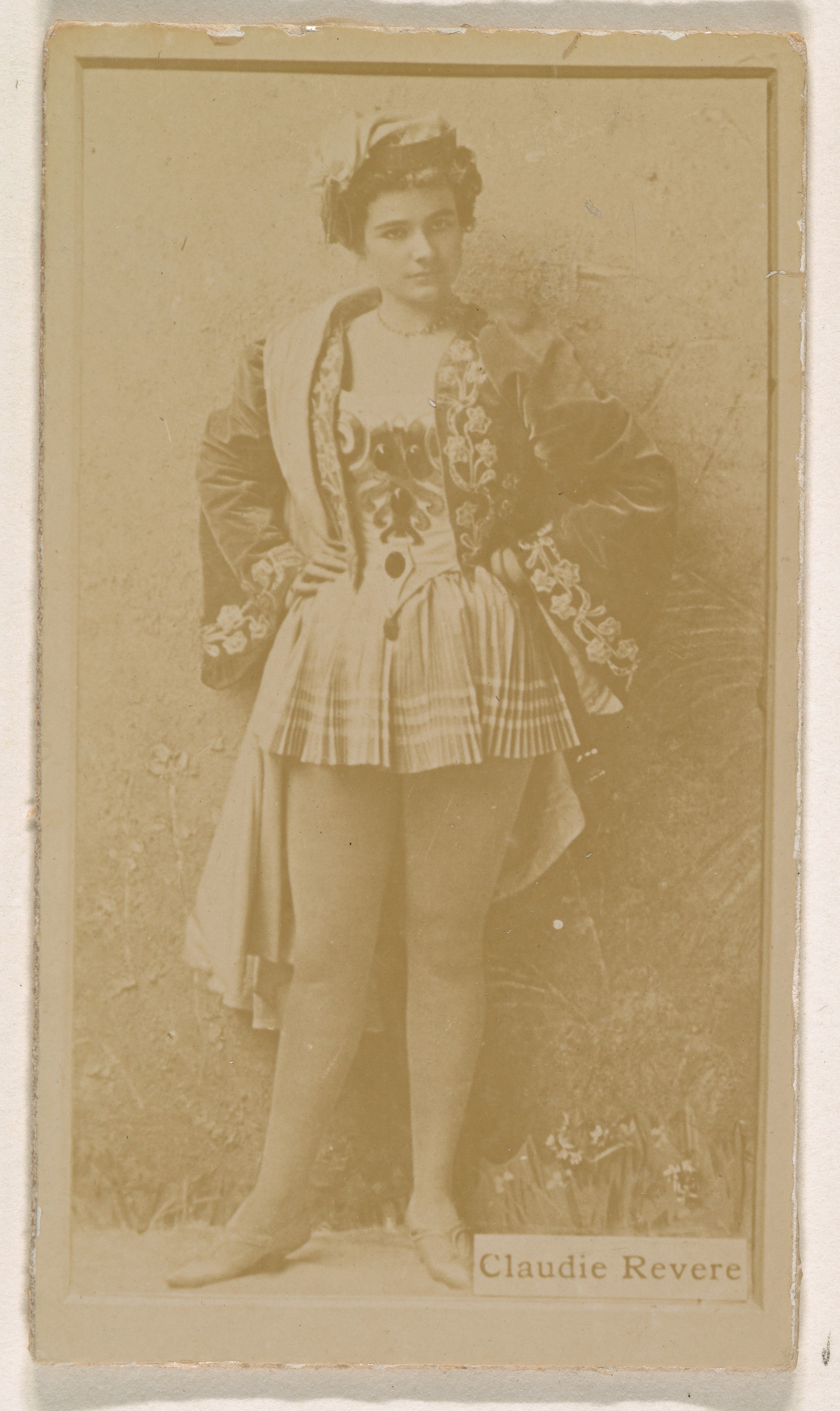 Claudie Revere, from the Actresses series (N245) issued by Kinney Brothers to promote Sweet Caporal Cigarettes