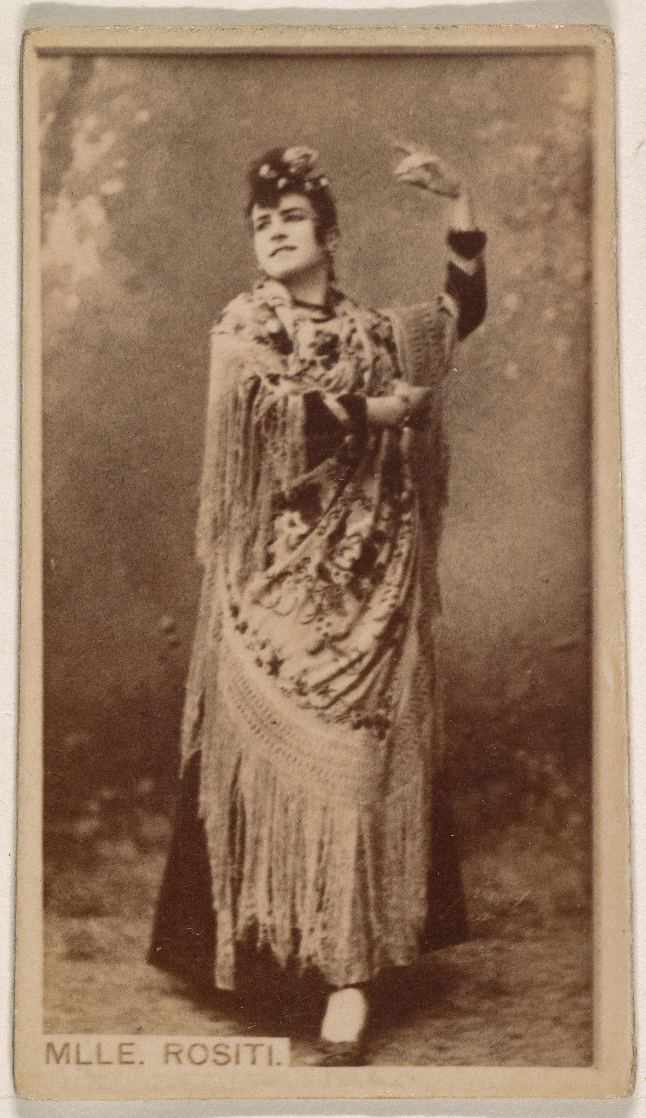 Mlle. Rositi, from the Actresses series (N245) issued by Kinney Brothers to promote Sweet Caporal Cigarettes