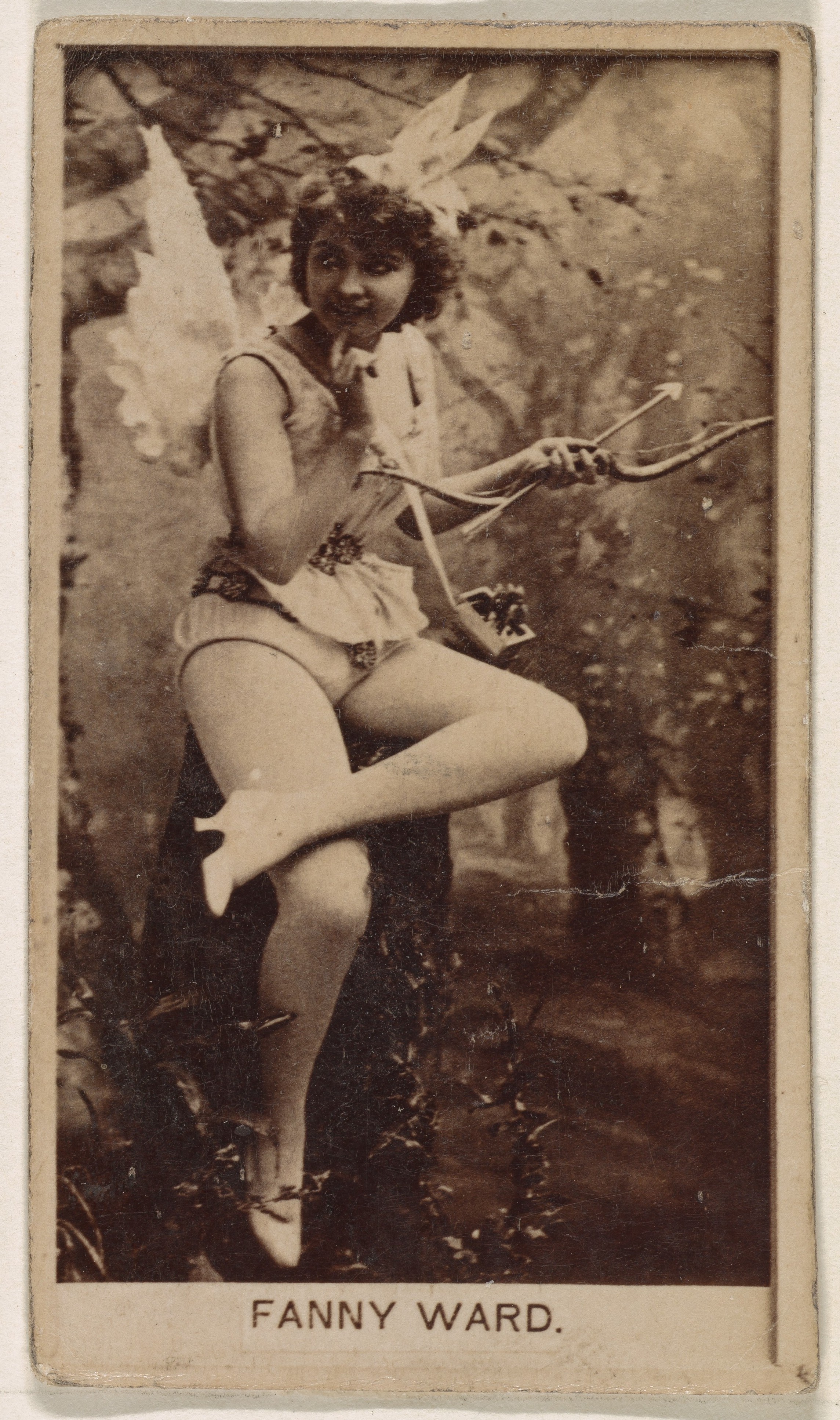 Issued by Kinney Brothers Tobacco Company, Miss Molke, from the Actresses  series (N245) issued by Kinney Brothers to promote Sweet Caporal Cigarettes