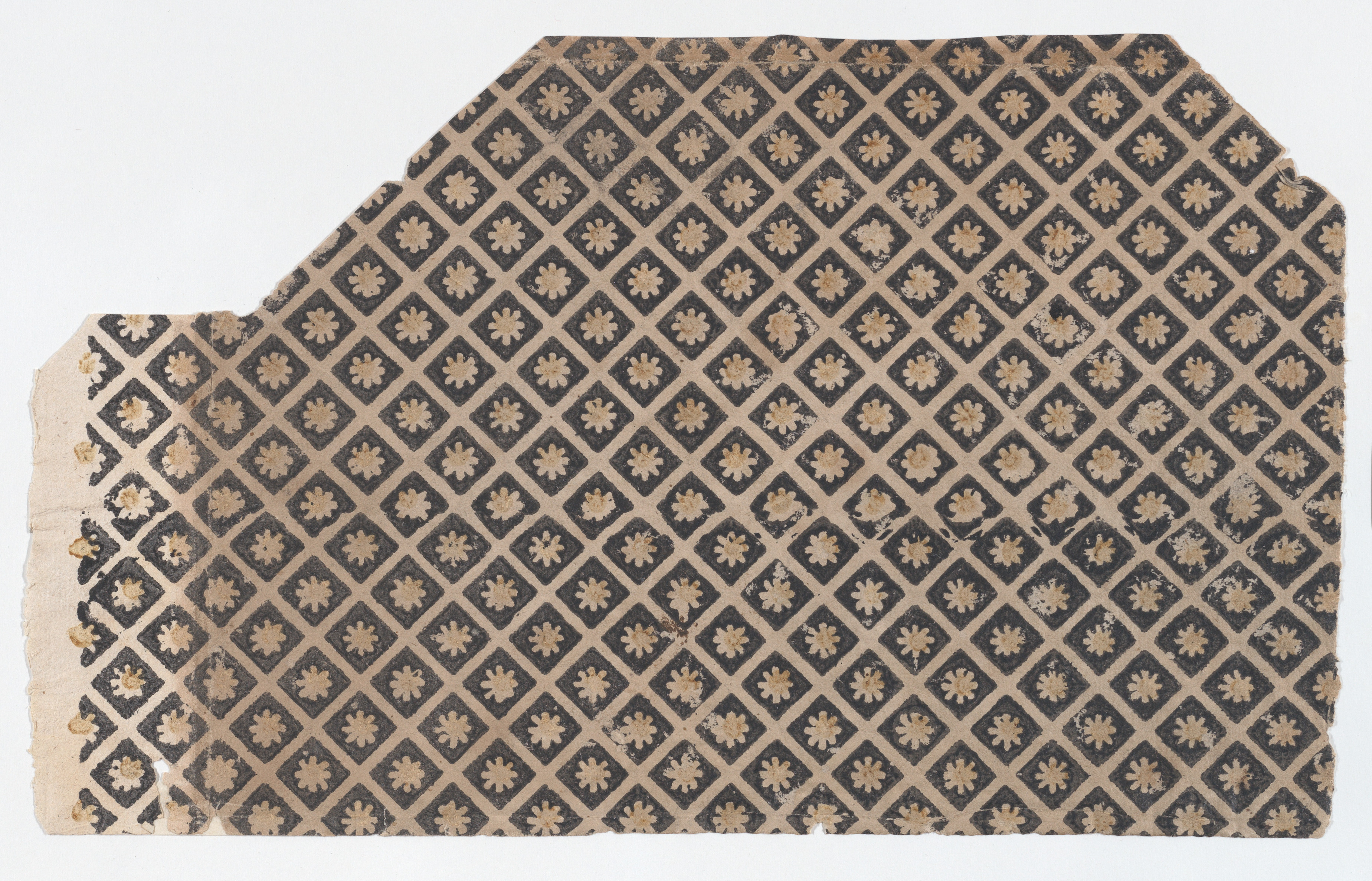 Sheet with overall pattern of flowers within squares
