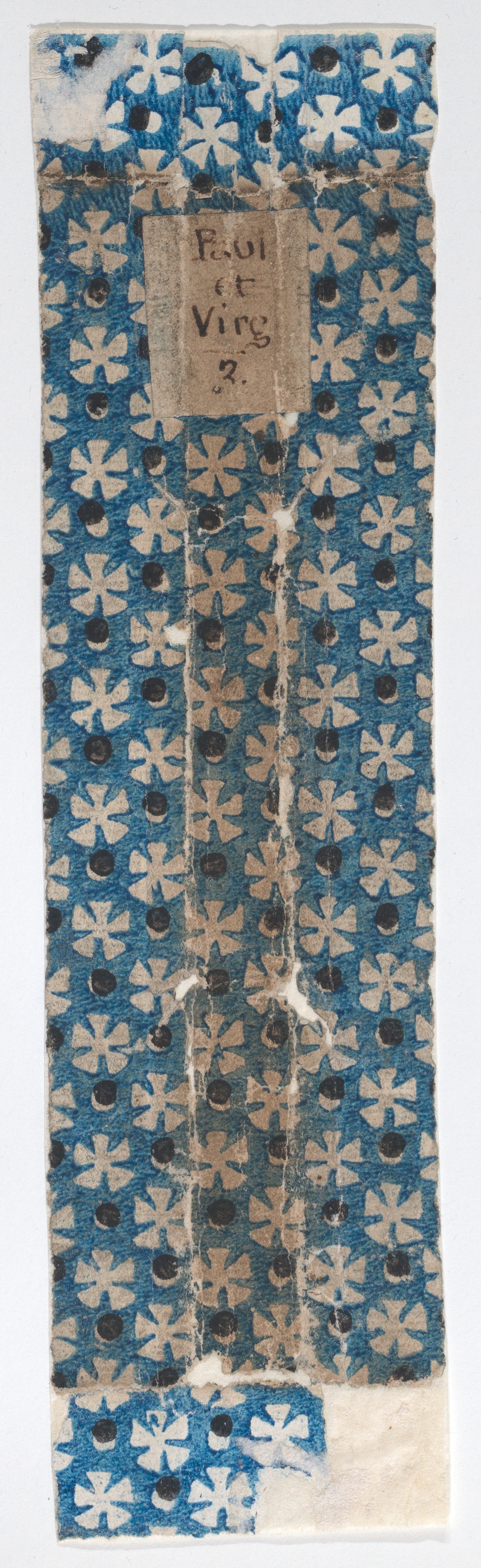 Book cover with overall pattern of stars or flower shapes and dots