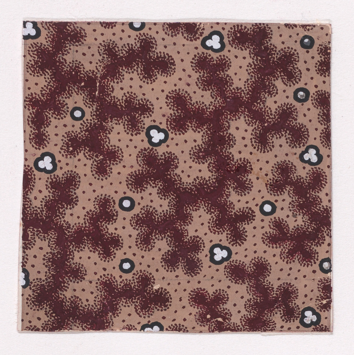 Textile Design with Abstract Bundles of Stylized Leaves and Pearls Over Dotted Background