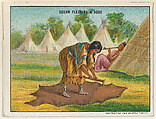 Squaw Fleshing a Robe, from the "Indian Life in the 60's" series (T73), issued with Hassan Cork Tip Cigarettes by the American Tobacco Company, American Tobacco Company, Commercial color lithograph