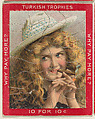 A Blonde Woman Wearing a White Hat and Smoking a Cigar, from the Jigsaw Puzzle Pictures series (T76) issued by Turkish Trophies Cigarettes, Turkish Trophies Cigarettes  American, Commercial color lithograph