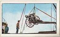 Card No. 201, Field Pieces Being Taken Aboard a Transport Steamer for Shipment to the Servians, from the World War I Scenes series (T121) issued by Sweet Caporal Cigarettes, American Tobacco Company, Photolithograph