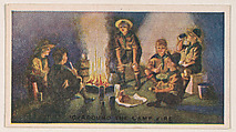 Card 10, Around the Camp Fire, from the Boy Scouts series (E41), issued by the Scout Gum Company or to promote Harlequin Taffy Candy, Scout Gum Company, Rochester, New York or American, Commercial color lithograph