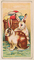 Two rabbits seated by basket of easter eggs, from the Easter Subjects series (E45) issued by the American Caramel Company to promote Easter Caramels, American Caramel Company, Philadelphia American, Commercial color lithograph