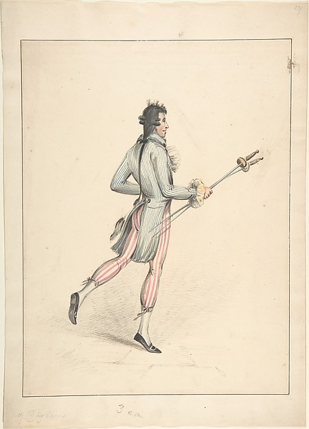 A man holding two fencing foils