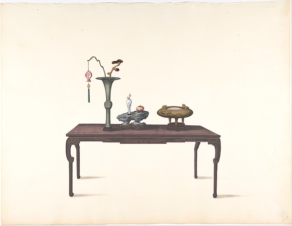 Long Dark Table with Decorative Objects