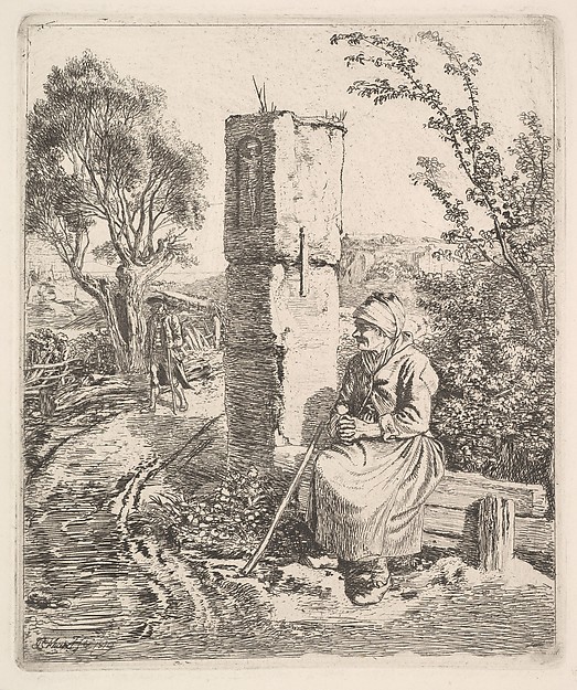 An Old Lady Sitting Near a Pillar at Side of Road