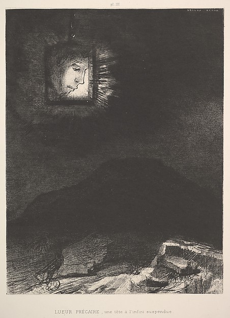 The vague glimmer of a head suspended in space