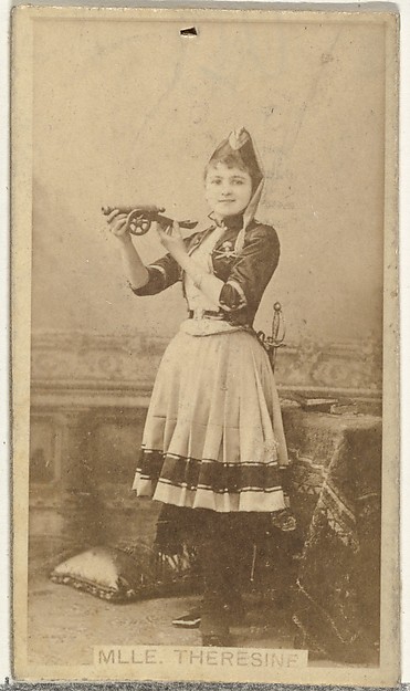 Mlle. Theresine, from the Actors and Actresses series (N145-8) issued by Duke Sons & Co. to promote Duke Cigarettes