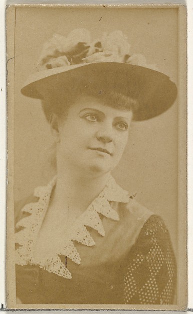 [Actress wearing dress with ornate lace collar], from the Actors and Actresses series (N145-8) issued by Duke Sons & Co. to promote Duke Cigarettes