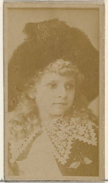 [Actress wearing dress with ornate lace collar], from the Actors and Actresses series (N145-8) issued by Duke Sons & Co. to promote Duke Cigarettes