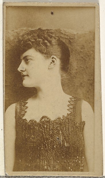[Actress in profile wearing ornate beaded gown], from the Actors and Actresses series (N145-8) issued by Duke Sons & Co. to promote Duke Cigarettes