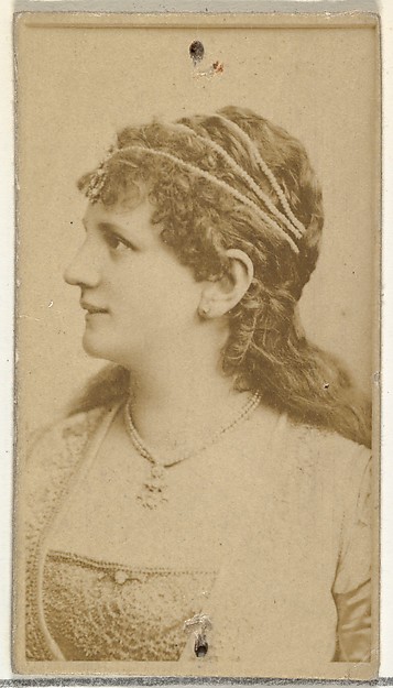 [Actress in profile wearing ornamental headpiece], from the Actors and Actresses series (N145-8) issued by Duke Sons & Co. to promote Duke Cigarettes