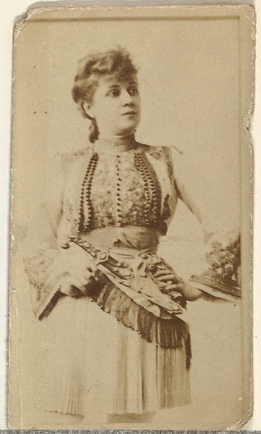 [Actress wearing fringed scarf], from the Actors and Actresses series (N145-8) issued by Duke Sons & Co. to promote Duke Cigarettes
