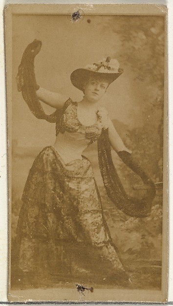 [Actress in full-length shows off ornate gown], from the Actors and Actresses series (N145-8) issued by Duke Sons & Co. to promote Duke Cigarettes