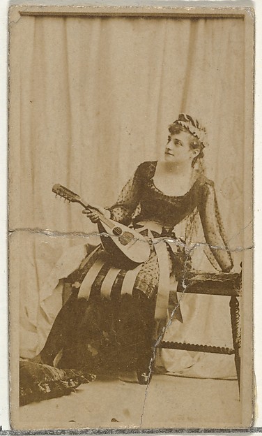 [Actress holding mandolin], from the Actors and Actresses series (N145-8) issued by Duke Sons & Co. to promote Duke Cigarettes