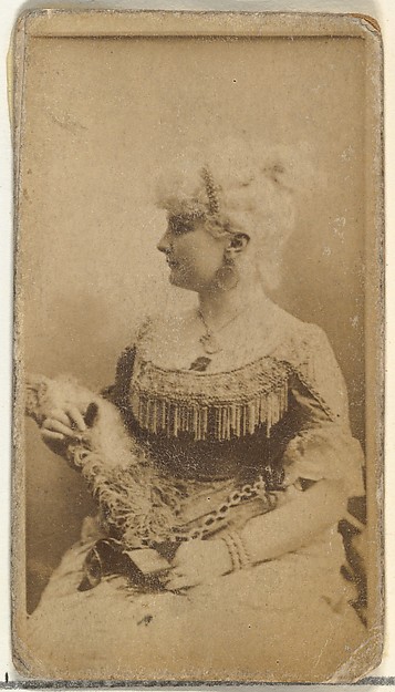 [Actress wearing dress with fringed bodice], from the Actors and Actresses series (N145-8) issued by Duke Sons & Co. to promote Duke Cigarettes
