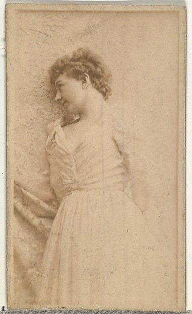 [Actress leaning against cloth backdrop], from the Actors and Actresses series (N145-8) issued by Duke Sons & Co. to promote Duke Cigarettes