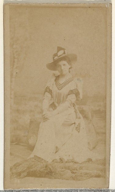 [Seated actress], from the Actors and Actresses series (N145-8) issued by Duke Sons & Co. to promote Duke Cigarettes