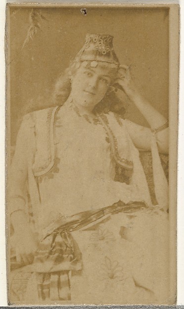 [Actress wearing exotic costume], from the Actors and Actresses series (N145-8) issued by Duke Sons & Co. to promote Duke Cigarettes