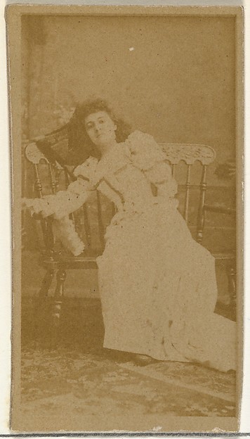 [Actress reclining on wooden seat], from the Actors and Actresses series (N145-8) issued by Duke Sons & Co. to promote Duke Cigarettes
