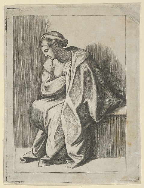 Woman sitting with her head turned downwards to her right and eyes closed