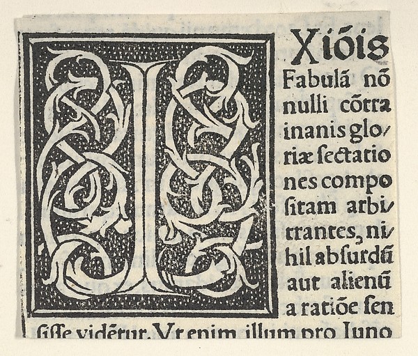 Initial letter I on patterned background