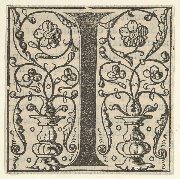 Initial letter I with garlands
