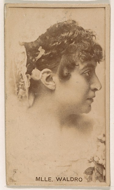Mlle. Waldro, from the Actresses series (N245) issued by Kinney Brothers to promote Sweet Caporal Cigarettes