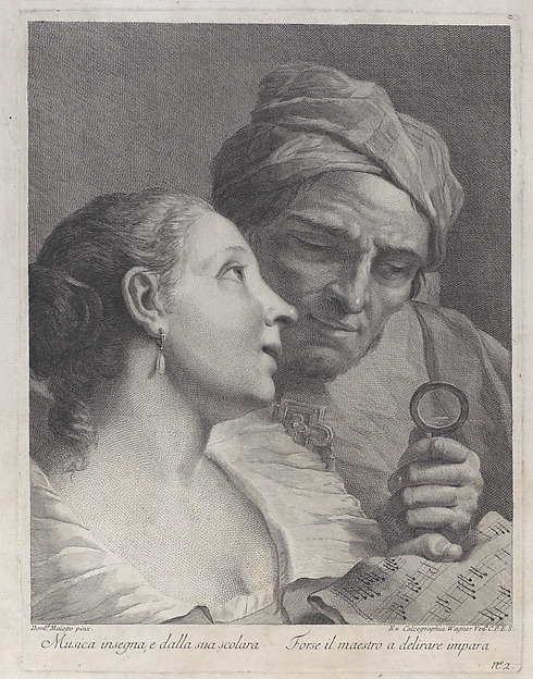 A schoolgirl and her music teacher looking at a sheet of music
