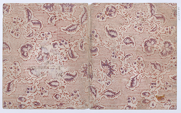 Book cover with overall paisley, dot, and stripe pattern