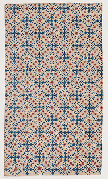 Sheet with an overall pattern of dots and squares