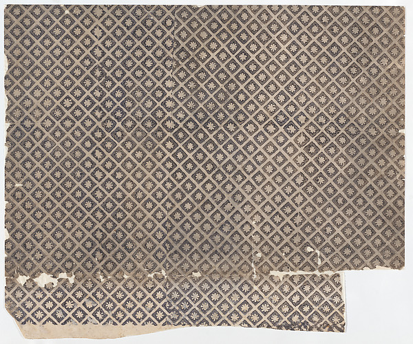Sheet with overall pattern of flowers within squares