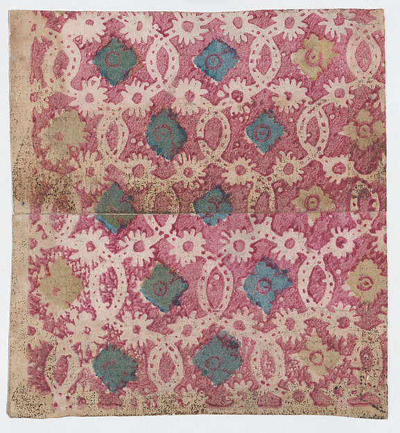 Sheet with overall lattice pattern with rosettes
