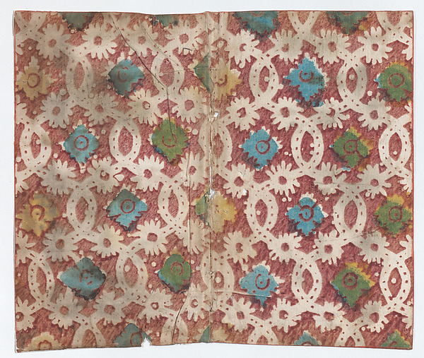 Sheet with overall lattice pattern with rosettes