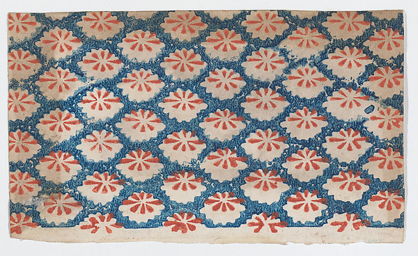 Sheet with overall pattern of ovals with red designs
