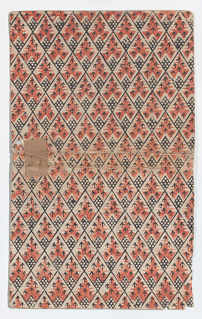 Book cover with overall diamond pattern with arrows