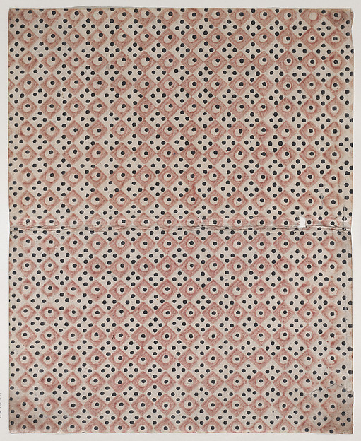 Book cover with overall pattern of red and black squares and dots