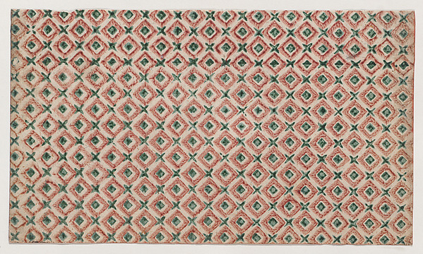 Sheet with overall pattern of squares and crosses