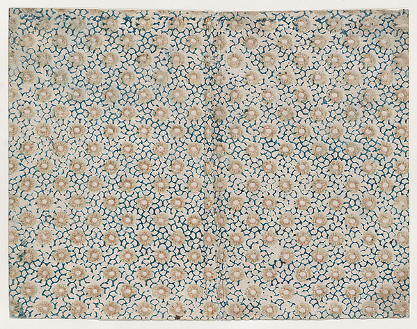 Book cover with yellow floral pattern atop blue curved lines