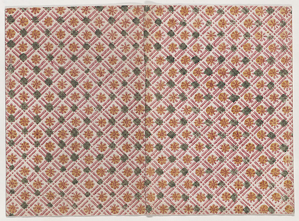 Book cover with geometric and floral pattern in red, yellow, and green