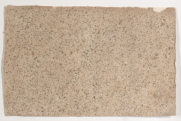Sheet with an overall brown speckle pattern