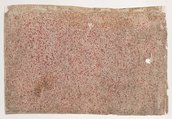 Sheet with an overall red speckle pattern